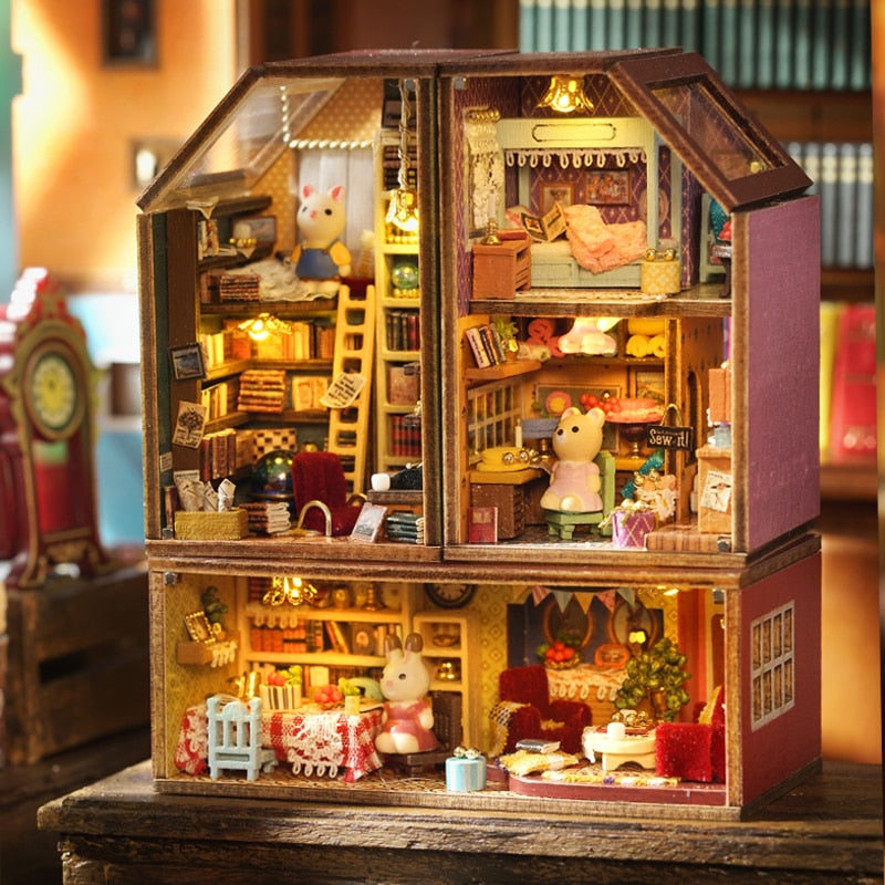 a doll house with a lot of furniture inside of it